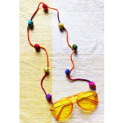 Silk beaded bauble spectacle string